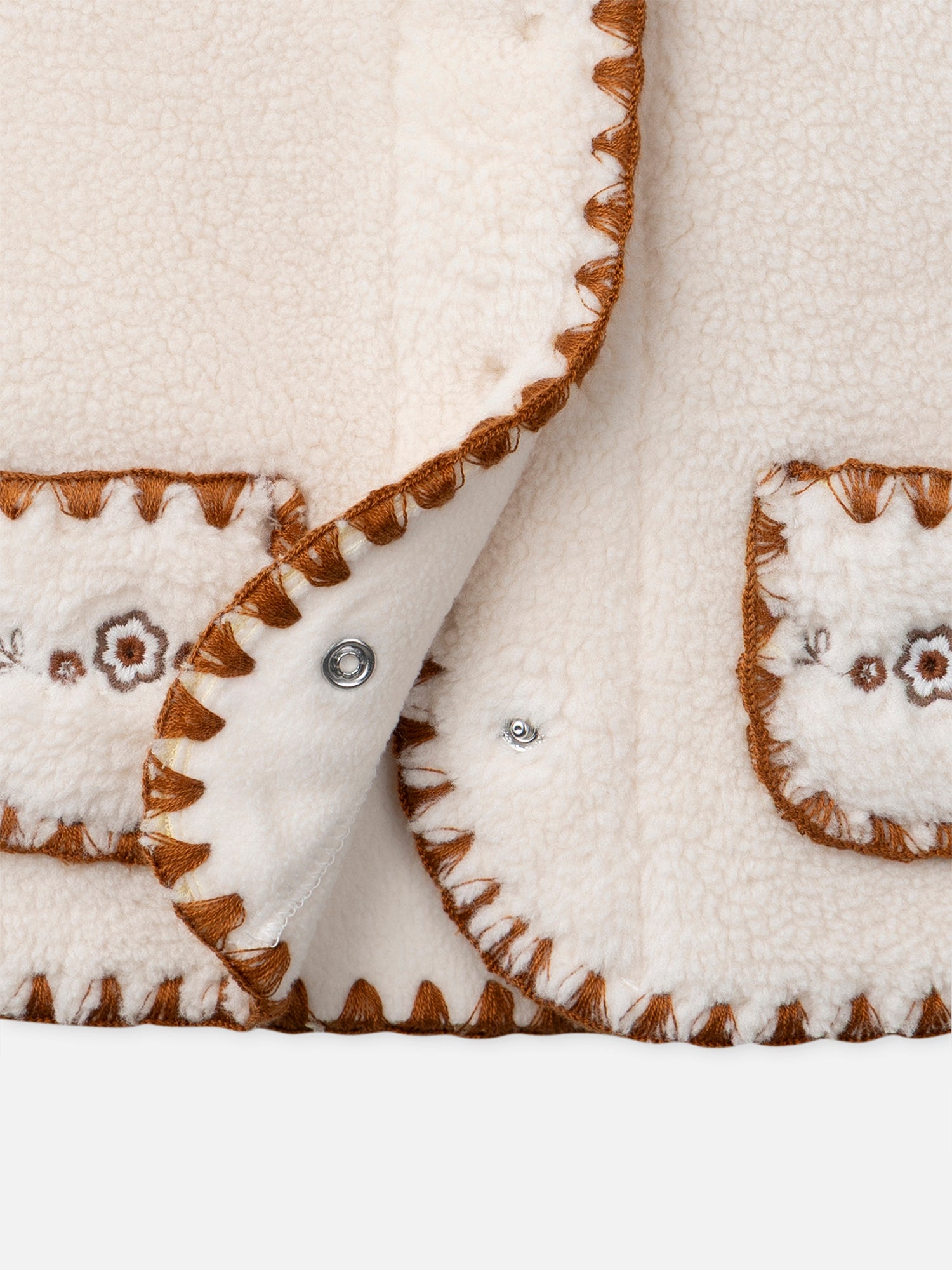 Cárdigan sin mangas color crudo para niñas