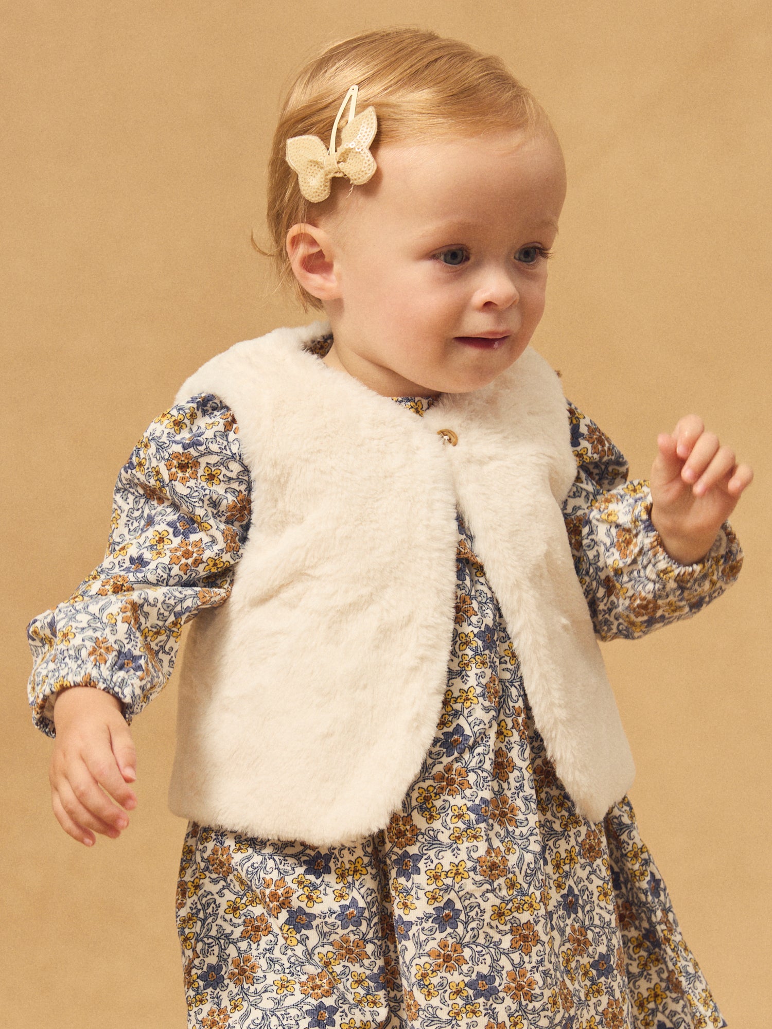 Chaleco reversible blanco de piel o estampado floral para bebé niña