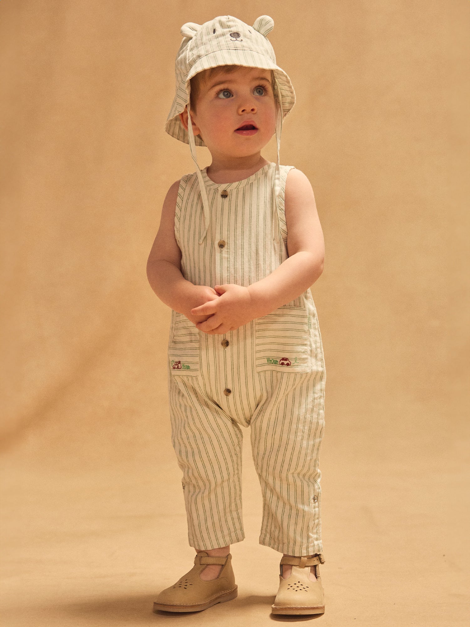 Mono blanco con rayas verdes bebé niño