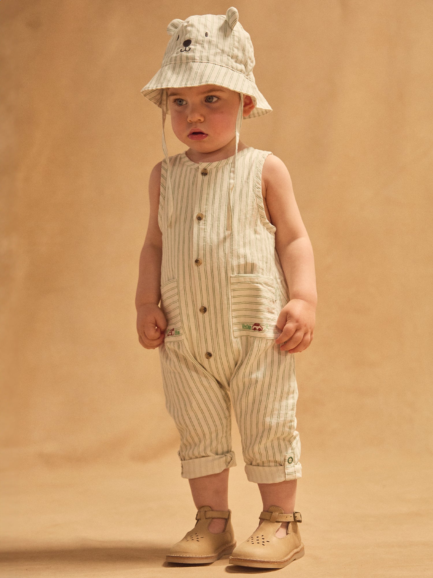 Salerito blanco con rayas verdes bebé niño.