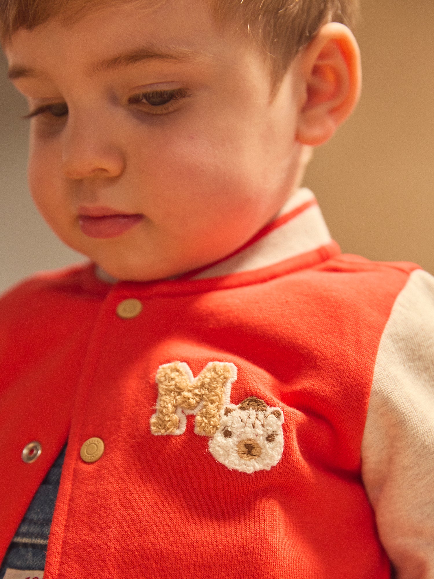 Veste Teddy rouge et écru Bébé Garçon