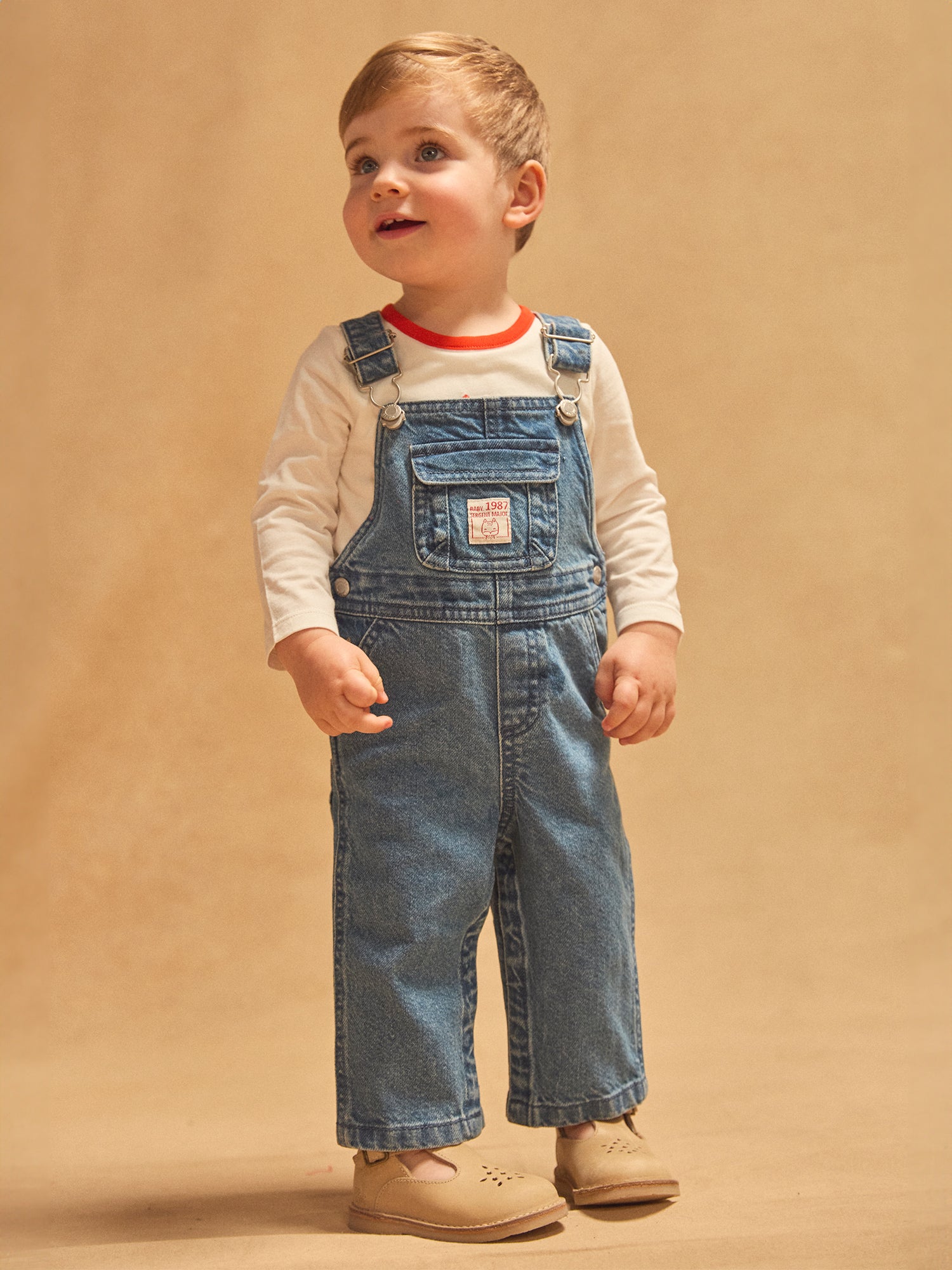 Peto de denim azul bebé niño