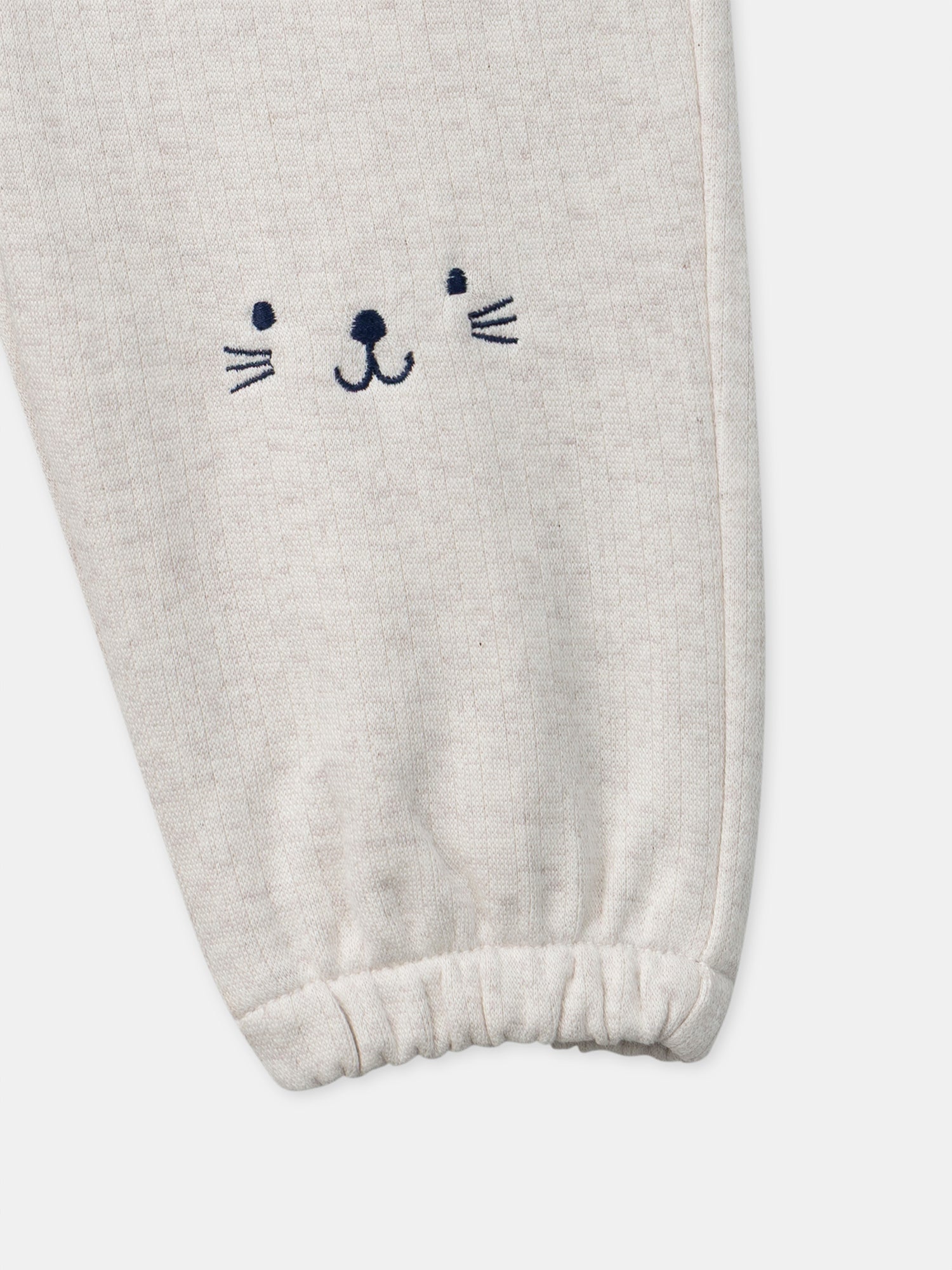 Pantalones ecru con cara de animal para bebé niño