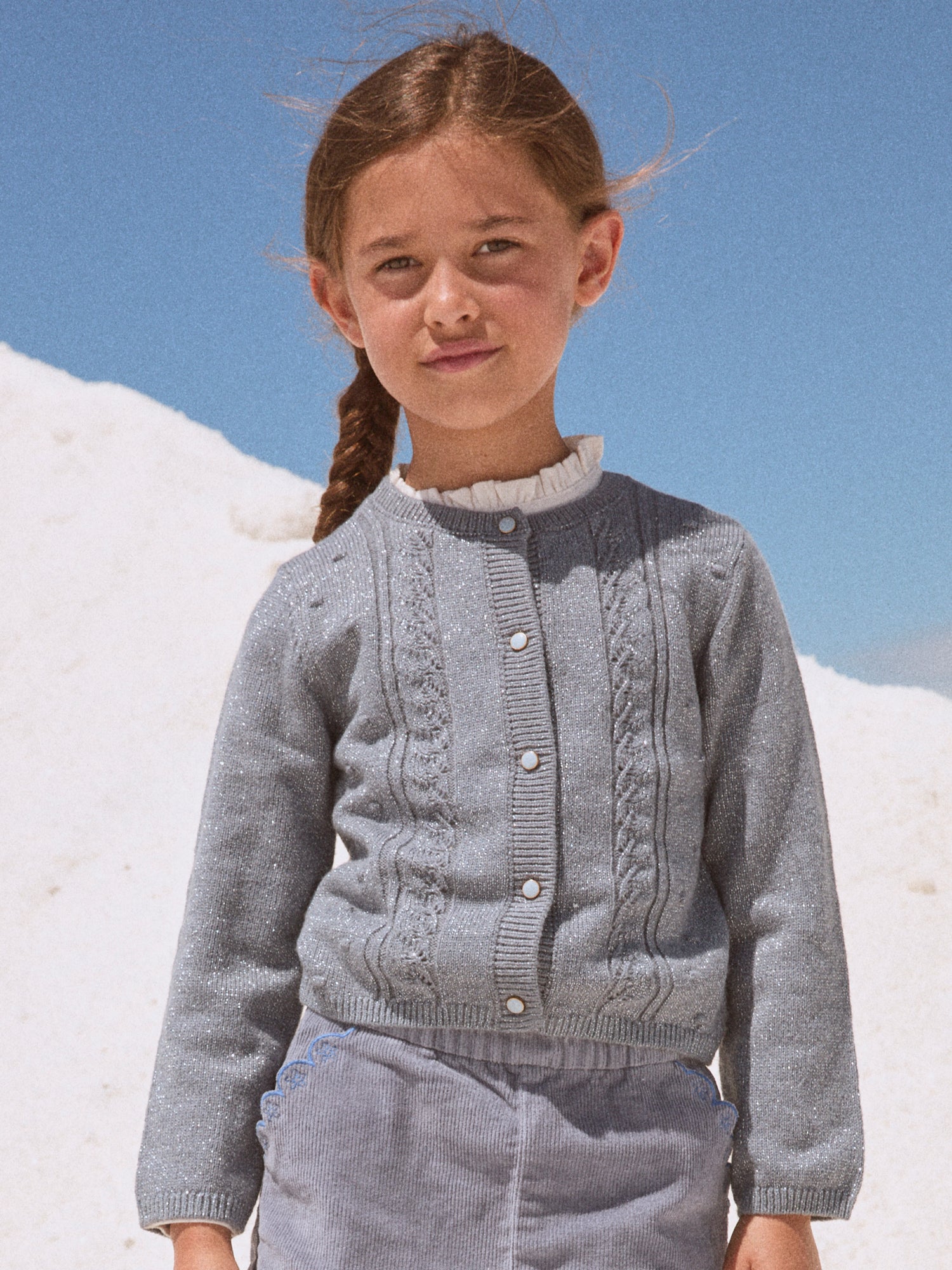 Cárdigan azul jaspeado para niña