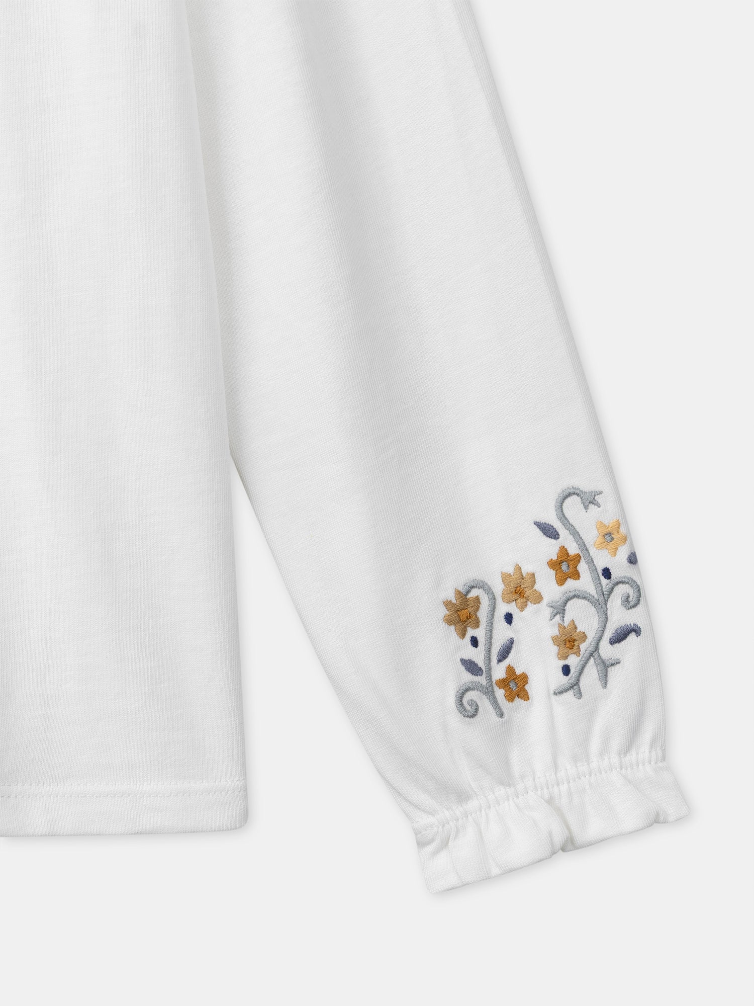 Camiseta blanca de manga larga con cuello floral para niñas