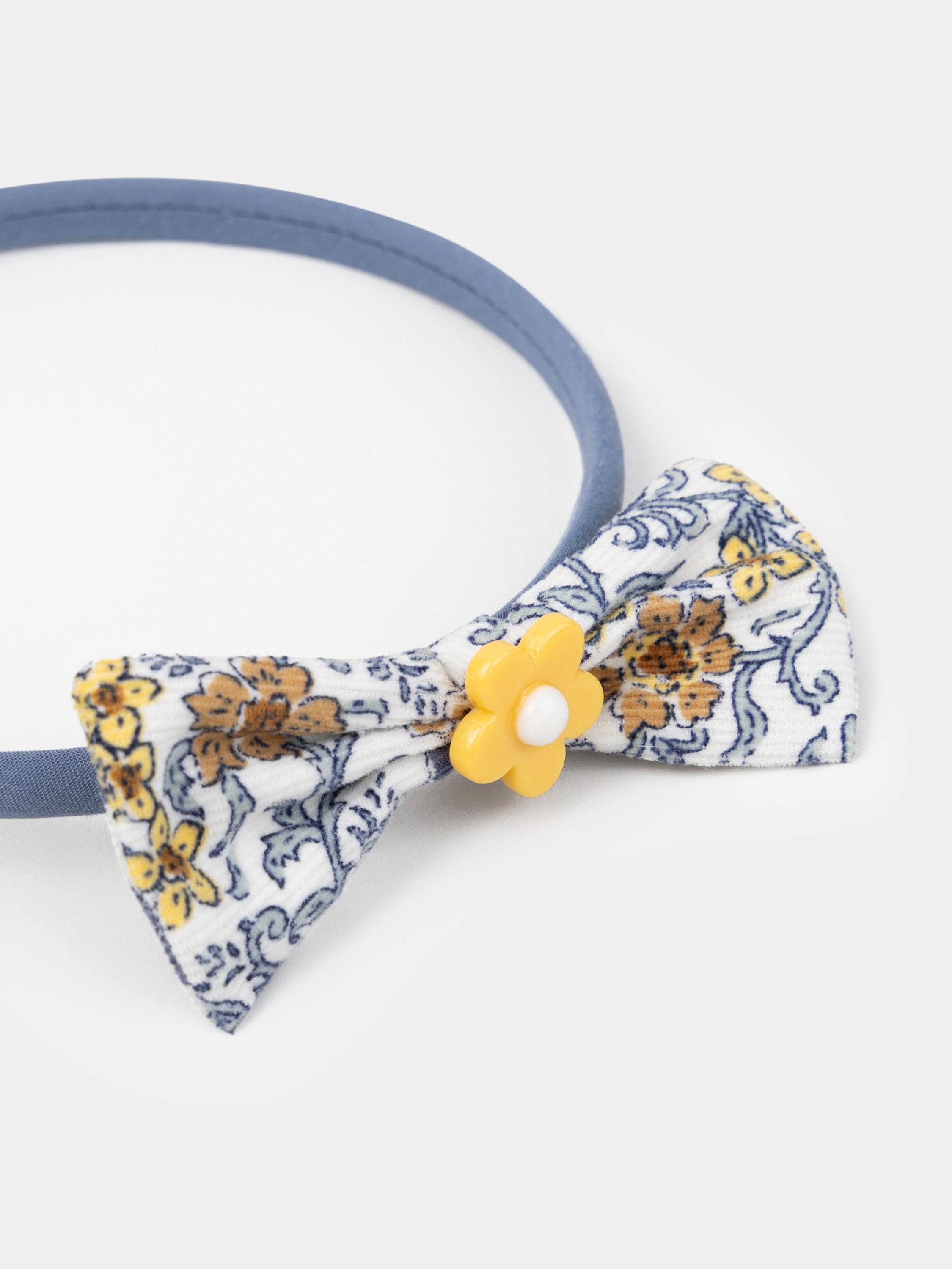 Diadema azul con lazo estampado floral y flor para niñas