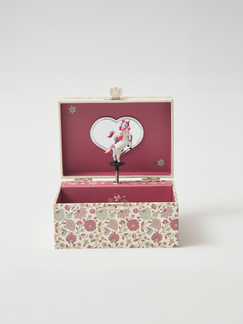 Caja de música de unicornio con estampado floral