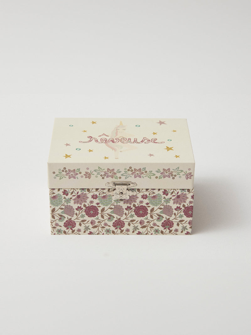 Caja de música de unicornio con estampado floral
