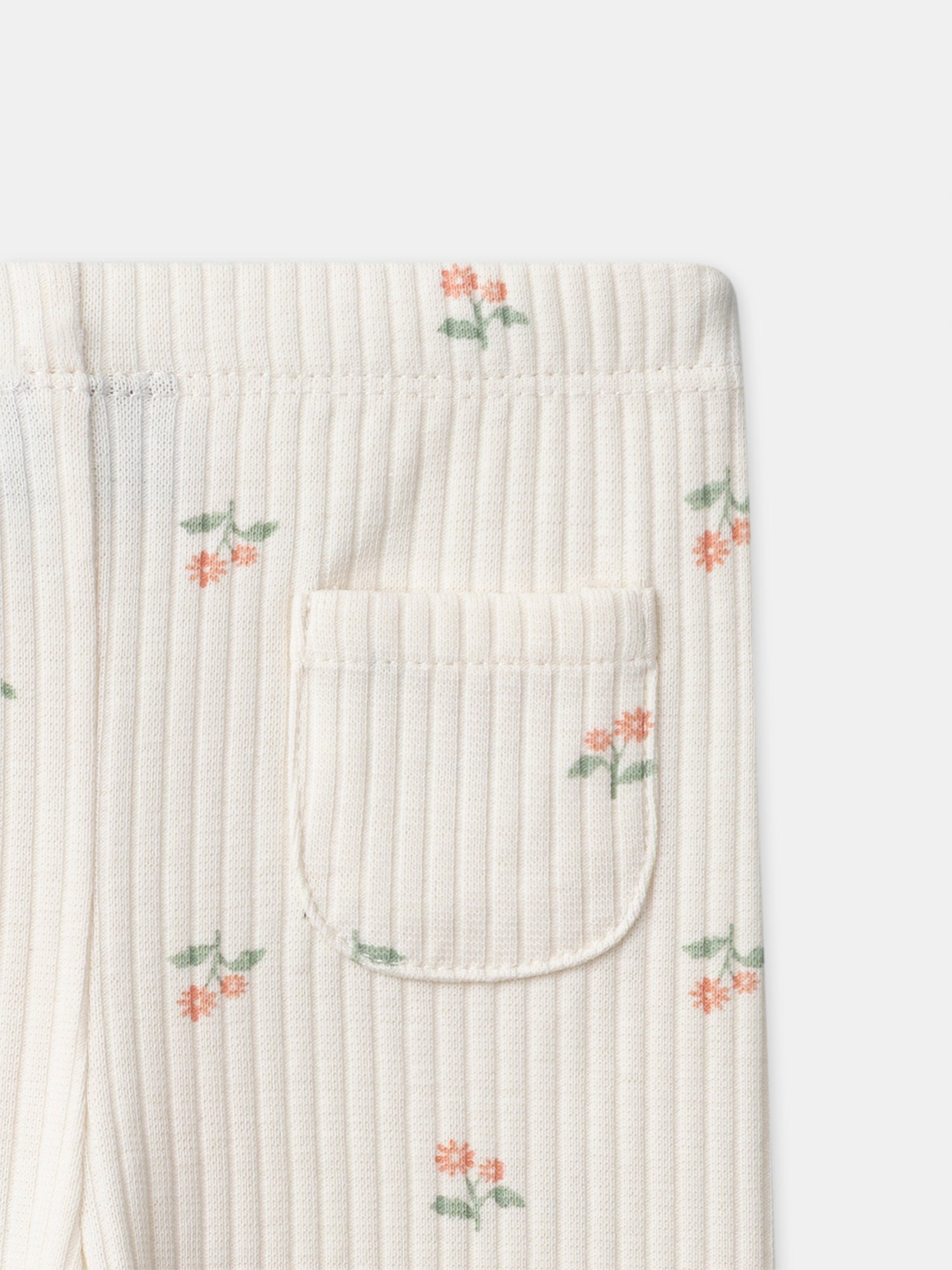 Leggings en color marfil con estampado floral para bebé niña