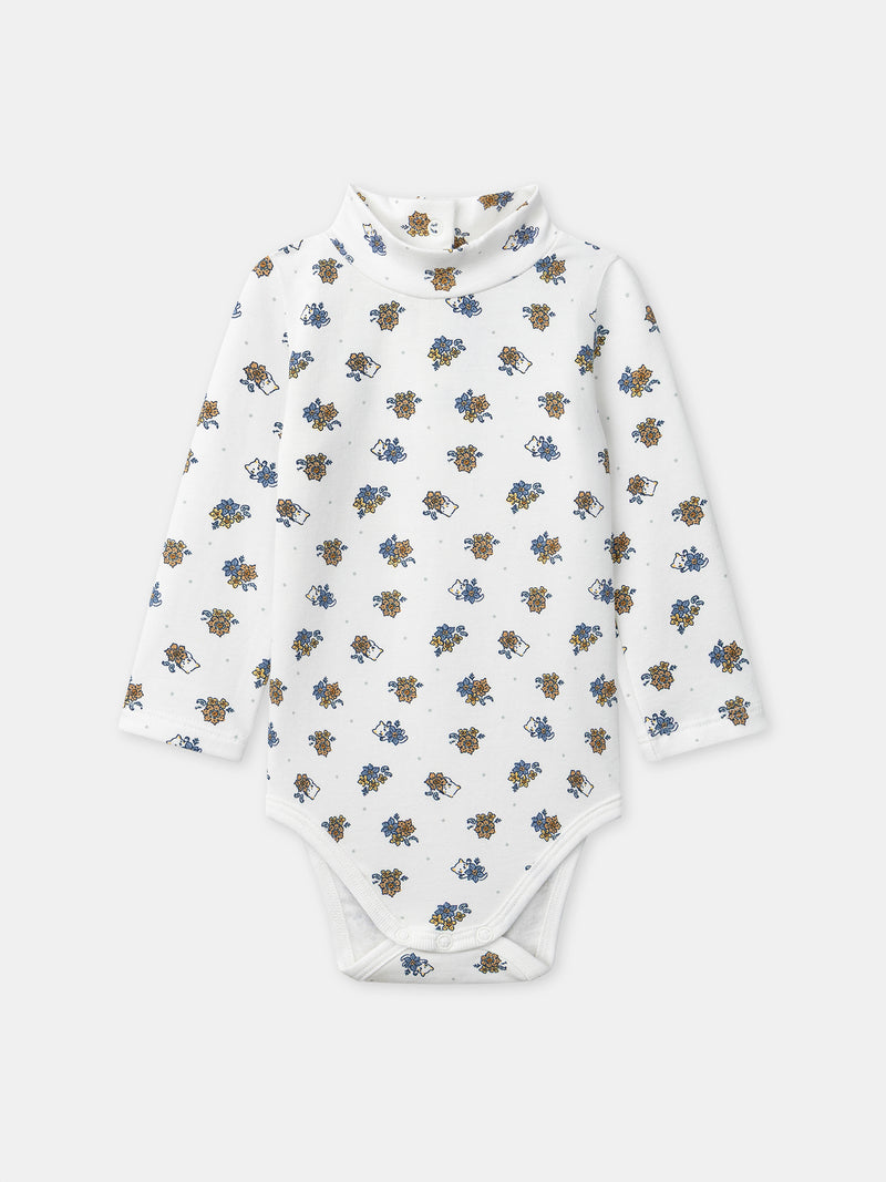 Cuerpo blanco con estampado floral y cuello de bebé para niñas