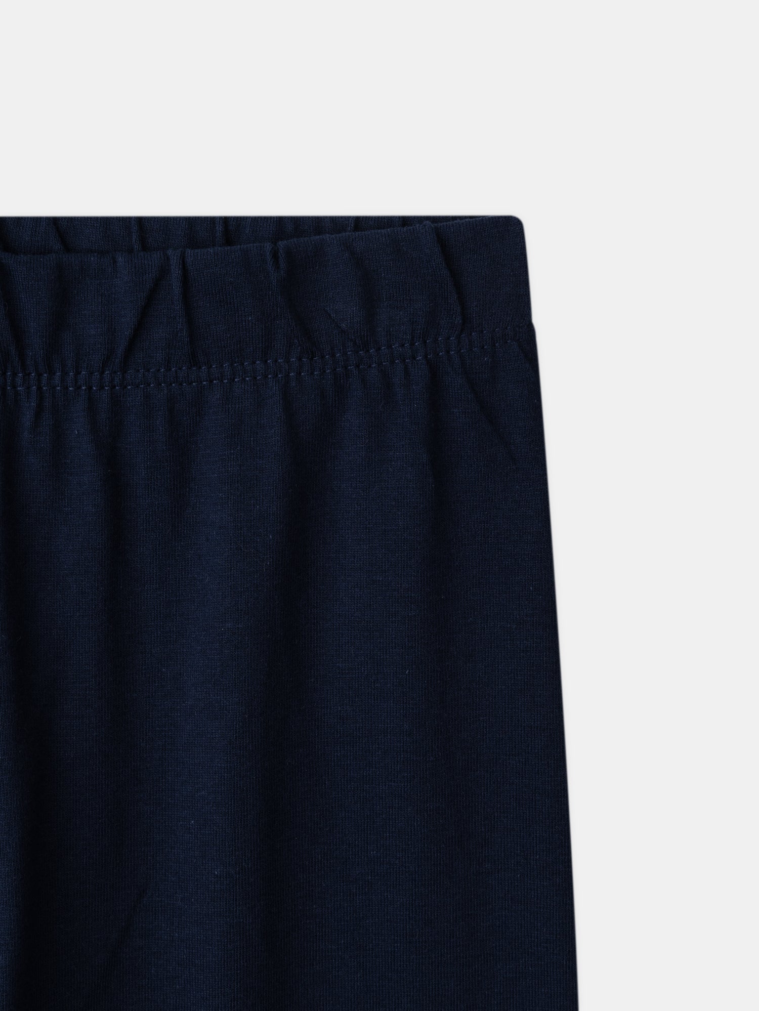 Pijamas azul cielo y marino con estampado de grifón Chico