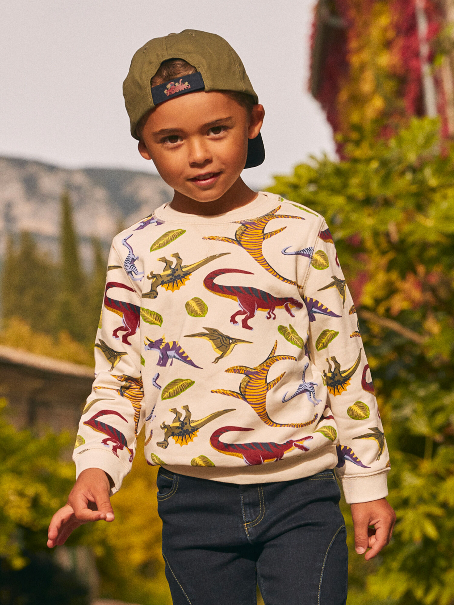 Sudadera color crudo con motivo de dinosaurio